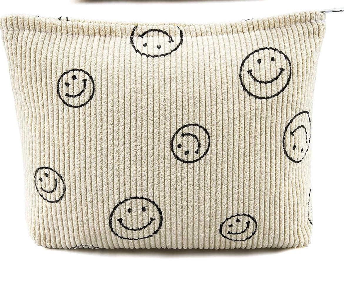 Smiley face makeup bags