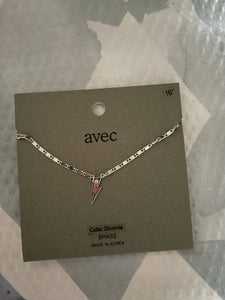 silver necklace with lightening bolt